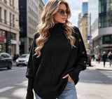 Cable Knit Turtleneck Poncho Sweater in black – view 5