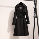 Double-Breasted Belted Trench Coat in black - view 6