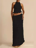 Isla Breeze Two-Piece Set with high-neck crop top and flowy maxi skirt in textured crinkle fabric, perfect for summer and beach outings.