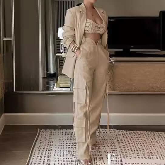 Elegant linen-blend two-piece set with high-waisted cargo pants and a modern blazer, perfect for day and night fashion.