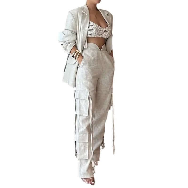 Woman wearing Power Linen Set with high-waisted cargo pants and blazer, showcasing sleek and chic style for day or night wear.