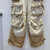 Desert Storm Cargo Pants with vintage finish and multi-pocket design, ideal for streetwear fashion enthusiasts seeking edgy style.