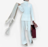 Comfortable turtleneck sweater and loose pant suit