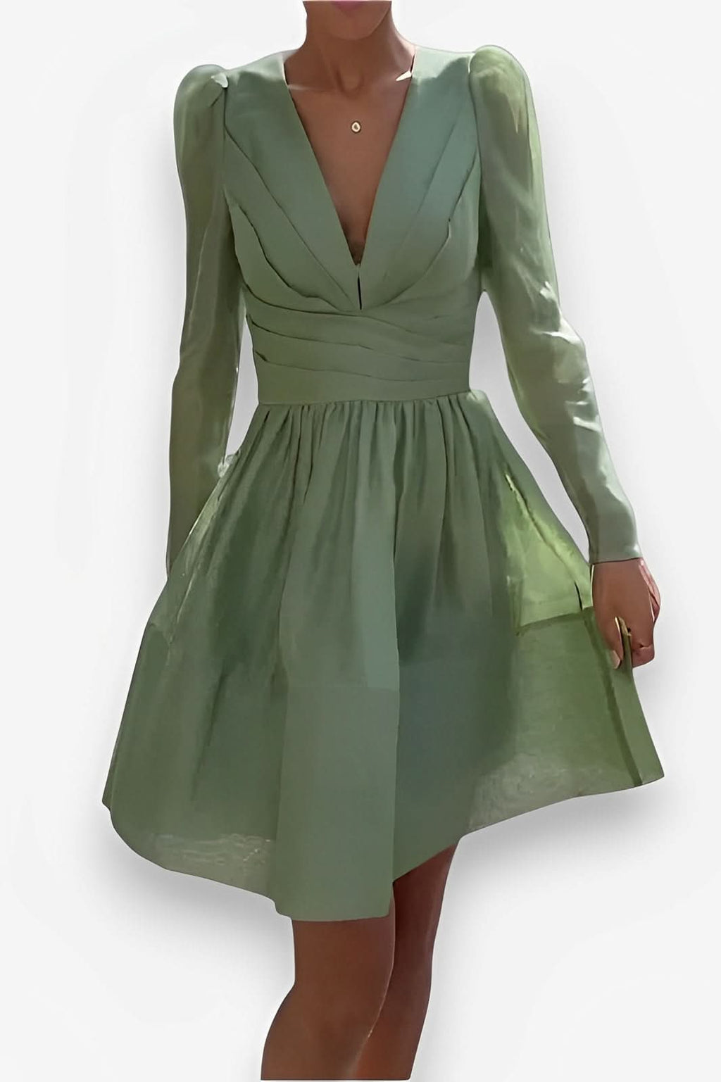 Mint green pleated cake dress - Dresses from The Woman Concept