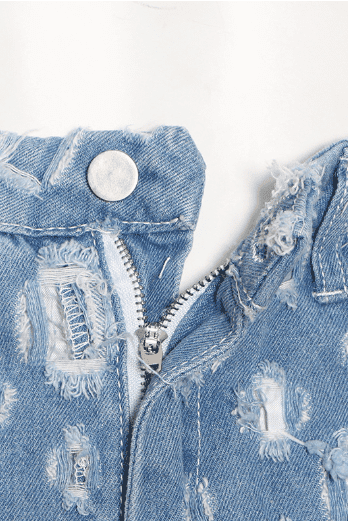 Street trendy ripped hole raw edge jeans.