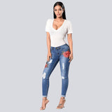 Stretch Embroidered Ripped Jeans - The Woman Concept
