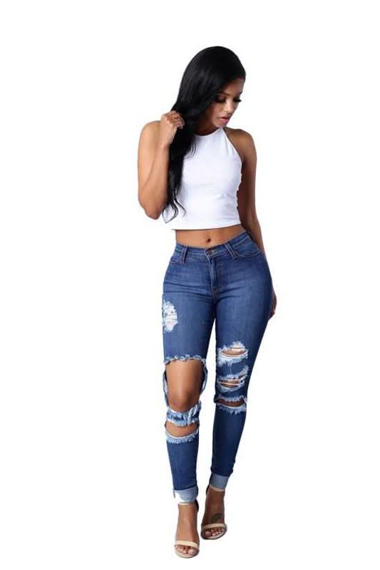 High Waist Jeans with Ripped Hips - The Woman Concept
