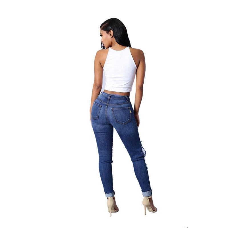 High Waist Jeans with Ripped Hips - The Woman Concept