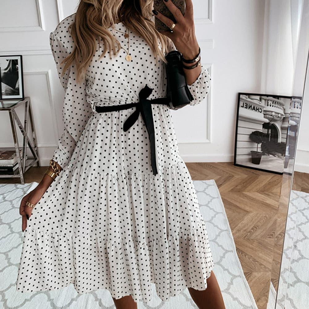 Midi White dress with polka dots.