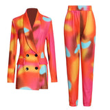 Double-breasted printed suit + elastic pants.