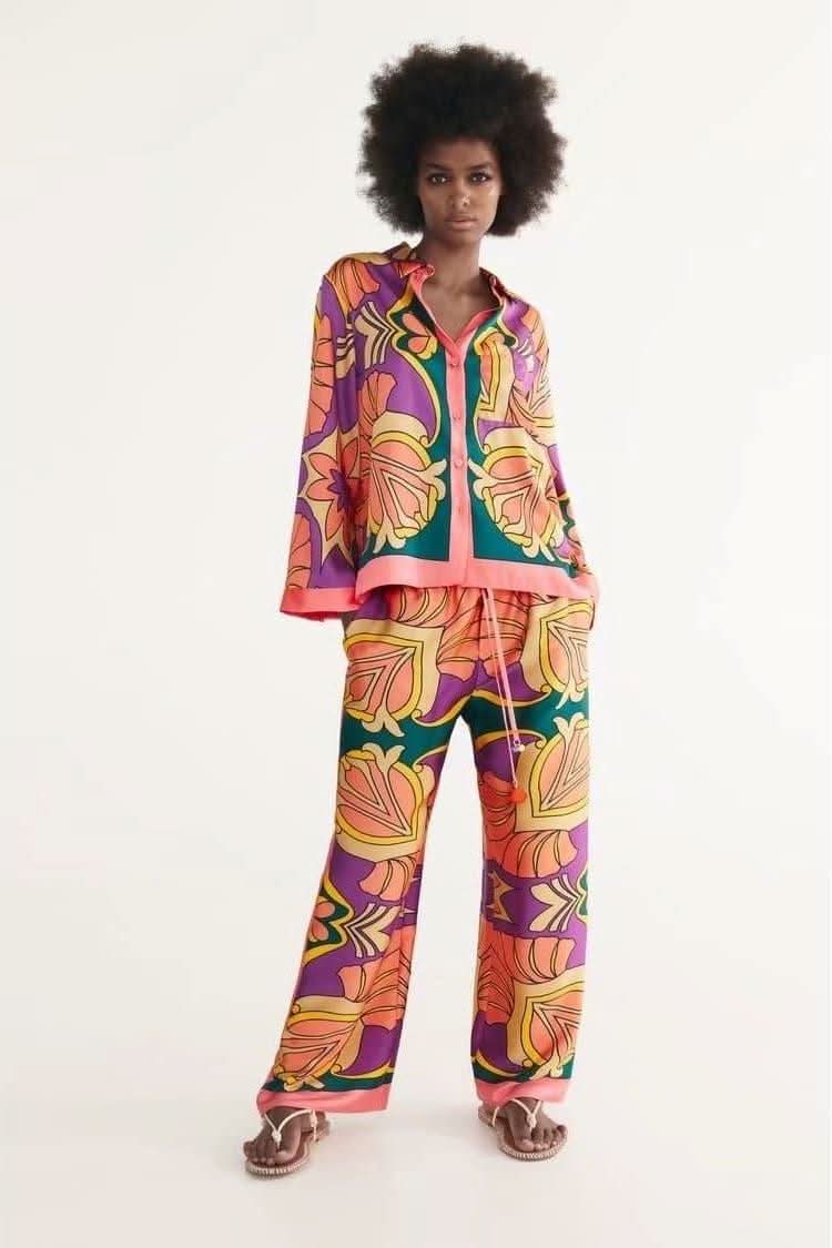 Lapel single-breasted decorated shirt and pants.