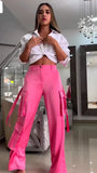 Pink parachute pants and white short shirt